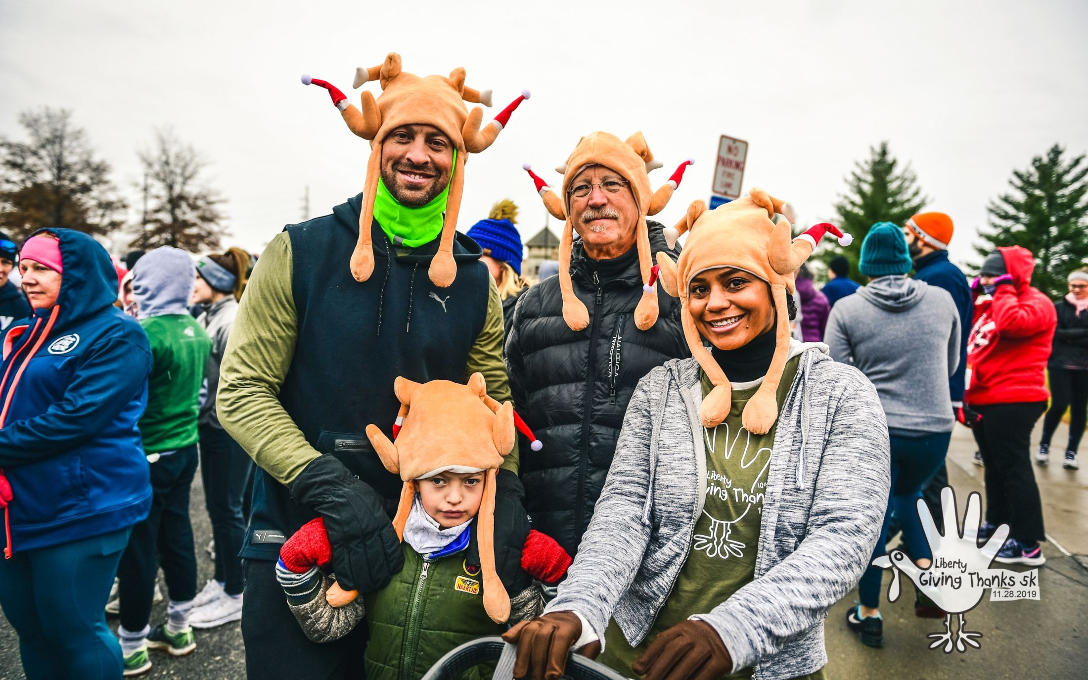 Liberty Giving Thanks family with turkey hats on
